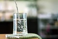 The Glass of the purified water on the table bar in kitchenroom Royalty Free Stock Photo
