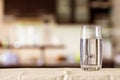the Glass of purified water on the table bar in kitchenroom Royalty Free Stock Photo