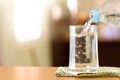 The Glass of the purified water on the table bar in kitchenroom Royalty Free Stock Photo