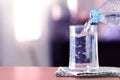 The Glass of the purified water on the table bar in kitchenroom Royalty Free Stock Photo