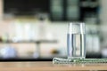 the Glass of purified water on the table bar in kitchenroom Royalty Free Stock Photo