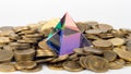 The glass pyramid lies on a pile of ten-ruble Russian coins Royalty Free Stock Photo