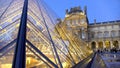 Glass pyramid of Louvre art museum in night Paris, France sightseeing, tourism