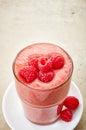 Glass of raspberry and banana smoothie Royalty Free Stock Photo