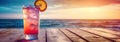 Glass with red aperol spritz cocktail on wooden table on beach near sea water at sunset. Summer vacation concept background. Royalty Free Stock Photo