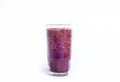 Glass of Red Grape Juice on a white background Royalty Free Stock Photo