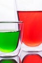 Glass of red and green water Royalty Free Stock Photo