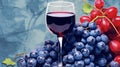 A glass of red wine against the background of bunches of different grapes