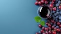 A glass of red wine against the background of bunches of different grapes Royalty Free Stock Photo