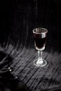 Glass of red wine on a black velvet background, close-up Royalty Free Stock Photo