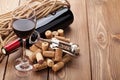 Glass of red wine, bottle and corkscrew Royalty Free Stock Photo