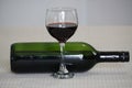 Glass of red wine and bottle Royalty Free Stock Photo