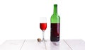 Glass with red wine bottle on white background, elegant and expensive red glass and bottle wine Royalty Free Stock Photo