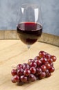 Glass of Red Wine and a Bunch of Grapes Royalty Free Stock Photo