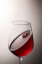 A glass of red wine with crown-looking surface Royalty Free Stock Photo