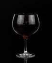 Glass of red wine on dark background. Happy hour and nightlife. Bar and restaurant Royalty Free Stock Photo