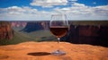 Glass of red wine on the edge. Australian wine concept.