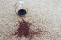 Glass of red wine fell on carpet, Royalty Free Stock Photo