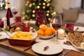 Glass of red wine and food on christmas table Royalty Free Stock Photo