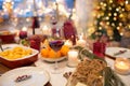 Glass of red wine and food on christmas table Royalty Free Stock Photo