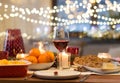 Glass of red wine and food on christmas table Royalty Free Stock Photo