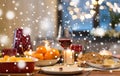 Glass of red wine and food on christmas table Royalty Free Stock Photo