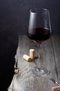 A glass of red wine on an old wooden table Royalty Free Stock Photo