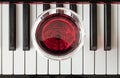 Glass of red wine on piano keyboard. Music and wine concept Royalty Free Stock Photo