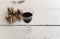 Glass of red wine and pile of corks Royalty Free Stock Photo