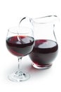 Glass of red wine with pitcher Royalty Free Stock Photo