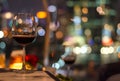A glass of red wine on table of rooftop bar