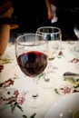 Glass of red wine after wine testing. Royalty Free Stock Photo