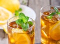 Glass of Refreshing Ice Tea With Lemon Slices and Mint Leaves Royalty Free Stock Photo