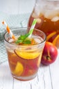 Glass of refreshing peach iced tea Royalty Free Stock Photo