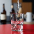 Glass of Refreshing Water with Splash Effect Royalty Free Stock Photo