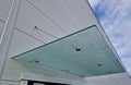 Glass roof above entrance industrial building with metal cladding Royalty Free Stock Photo