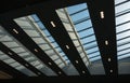 The glass roof of a building against sky Royalty Free Stock Photo