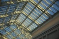 Glass roof in shopping mall. Details of interior in building. Light through glass. Dome in building Royalty Free Stock Photo