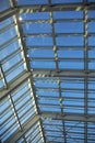 Glass roof in shopping mall. Details of interior in building. Light through glass. Dome in building Royalty Free Stock Photo