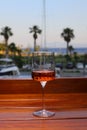 glass of rose or blush wine on the beach Royalty Free Stock Photo
