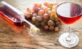 Glass of rose wine with bunch of grape Royalty Free Stock Photo