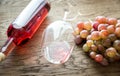 Glass of rose wine with bunch of grape Royalty Free Stock Photo