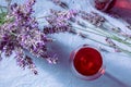 A glass of rose wine with lavender flowers, overhead flat lay shot Royalty Free Stock Photo