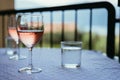 Enjoying a glass of rose wine on the veranda, summer holiday in Italy Royalty Free Stock Photo