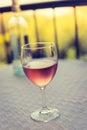 Enjoying a glass of rose wine on the veranda, summer holiday in Italy Royalty Free Stock Photo