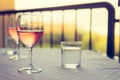 Enjoying a glass of rose wine on the veranda, summer holiday in Italy Royalty Free Stock Photo