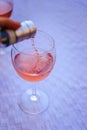 Enjoying a glass of rose wine on the veranda, summer holiday in Italy Royalty Free Stock Photo
