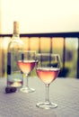 Enjoying a glass of rose wine on the veranda, summer holiday in Italy Royalty Free Stock Photo