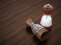 Glass salt and pepper grinder set standing on wooden table. 3D illustration