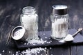 Glass salt shakers with sea salt coarse and fine Royalty Free Stock Photo